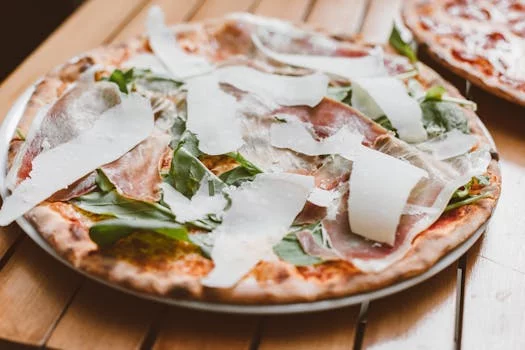 prosciutto pizza arugula parmesan fresh