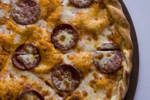 pepperoni pizza melted cheese crispy crust
